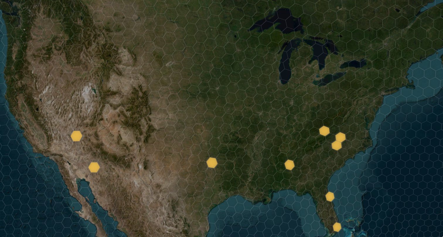 Satellite view of the United States with H3 cells lit at NASCAR tracks